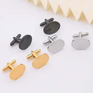 Close-up of three pairs of oval polished metal cufflinks in gold, silver and gun black