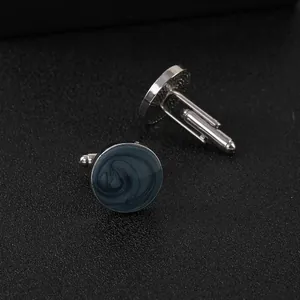 Gemelli rotondi in argento con inserto in marmo grigio e chiusura a scatto a T