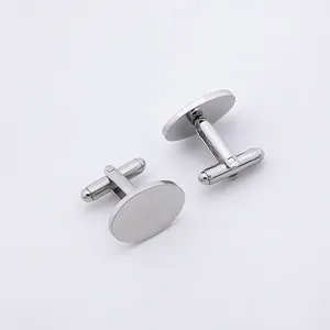 Macro detail of polished stainless steel oval cufflinks for men with T-link swivel back