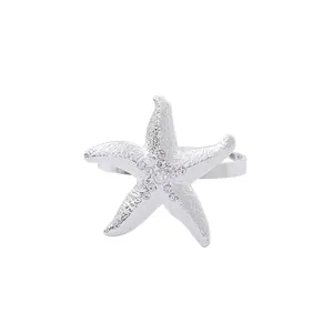Silver starfish napkin ring with sparkling rhinestones for elegant table decoration