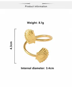 Macro view of gold shell napkin ring with dimensions 4.3cm height and 3.4cm inner diameter