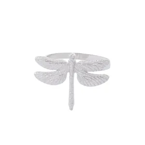 Elegant silver dragonfly metal napkin ring featuring textured wings and a polished finish