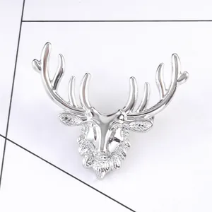 Vintage silver stag deer head brooch pin for suits with detailed antlers and metallic finish