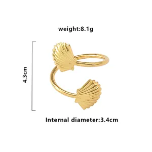 Creative golden shell napkin ring with spiral metal design and ocean inspired style