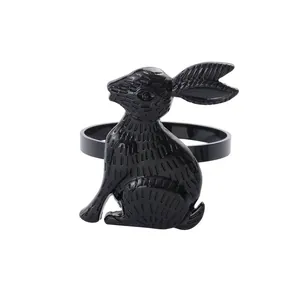 Easter bunny rabbit napkin ring in black alloy with detailed fur texture on white background