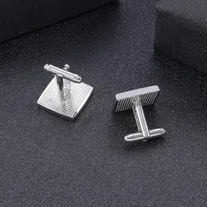 Square silver cufflinks for men with chessboard texture and toggle closure design