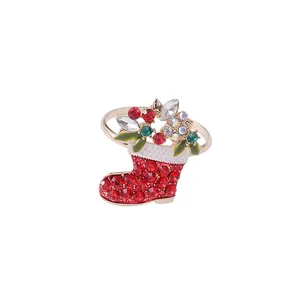 Christmas stocking napkin ring with red rhinestones and gold finish for table decor