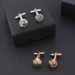 Gemelli da polso a nodo intrecciato in argento e oro per camicie eleganti da uomo