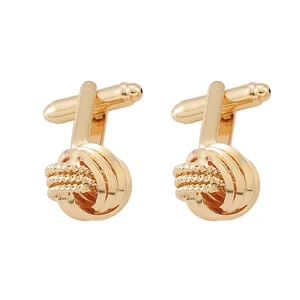 Eleganti gemelli da uomo color oro a forma di nodo con chiusura a scatto a T