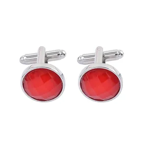 Classic silver round cufflinks with faceted red gemstone and swivel toggle closure