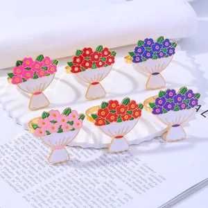 Juego de seis servilleteros de aleación con rosas de colores en una bandeja decorativa