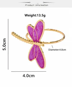 Detailed view of golden dragonfly napkin ring with purple enamel wings and dimensions
