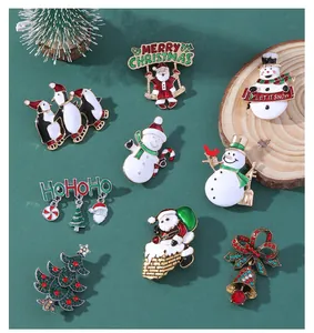 Detailed macro view of enamel Christmas brooches featuring Santa, snowmen, and reindeer designs