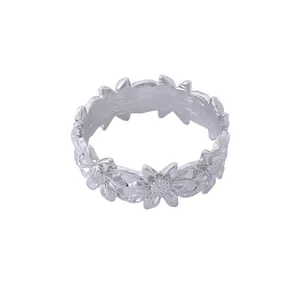 Elegant silver sunflower napkin ring with detailed flower patterns for dining table decor