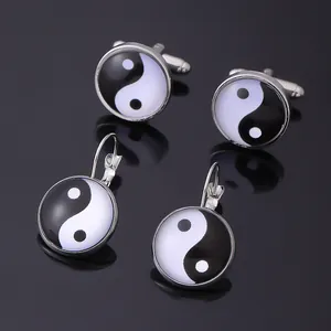 Manschettenknöpfe und Ohrring Set mit Yin-Yang-Motiv aus poliertem Silbermetall