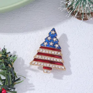 Macro detail of Christmas tree brooch featuring American flag patterns and rhinestones