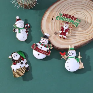 Five-piece Christmas enamel brooch set featuring Santa Claus and snowman festive designs