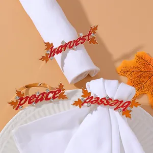 Golden harvest peace and blessed napkin rings with red enamel maple leaf design