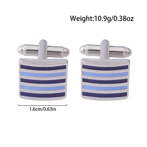 Detailed view of silver striped cufflinks with blue enamel showing 1.6cm width and 10.9g weight