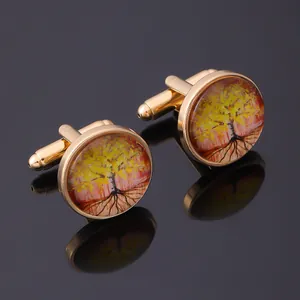 Artistic Tree of Life cufflinks for men in polished gold metal with autumn leaf design