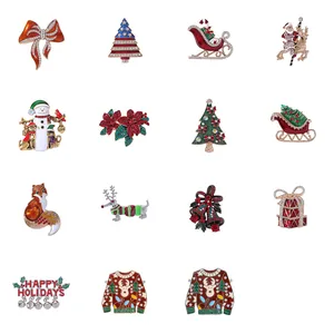 Collection of 15 Christmas brooches including Santa, reindeer, and trees with rhinestones