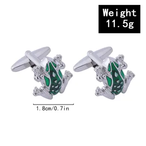 Detailed view of green frog cufflinks with silver metal finish and enamel patterns