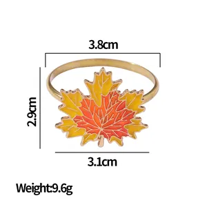 Creative maple leaf napkin ring with autumn color gradient and gold metal finish