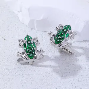 Elegant green frog shaped cufflinks in silver metal with vivid green enamel texture