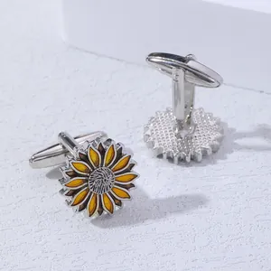 Detailed view of sunflower cufflinks with yellow enamel petals and silver T-shaped toggle