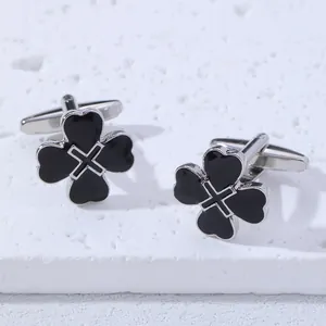 Silver four-leaf clover cufflinks for men with black enamel and polished metal finish