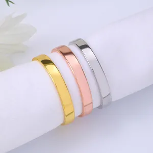 Minimalist round napkin ring set in gold silver and rose gold polished finish