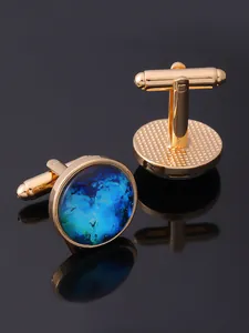 Detail of gold-tone starry nebula enamel cufflinks with secure swivel T-bar closure