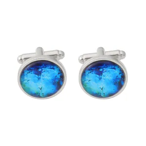 Men's silver round cufflinks featuring a blue starry nebula art stone inlay design
