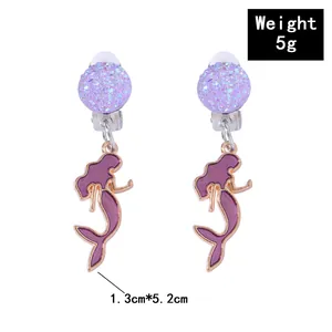 Detail view of purple mermaid clip-on earrings for kids showing size 1.3cm by 5.2cm