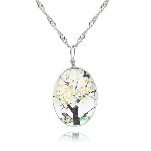 Collier arbre de vie en cristal avec fleurs séchées jaunes et pendentif papillon vintage