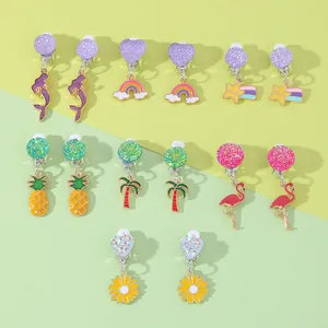 7-pack clip-on earrings set for girls featuring mermaid rainbow and pineapple designs