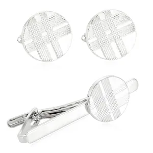 Men's silver tie clip and cufflinks set with cross-hatch pattern on white background