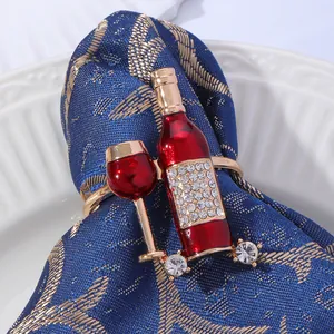 Sparkling wine bottle and glass napkin ring with red enamel and micro-set zircon