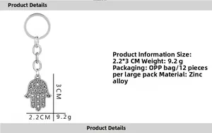 Detail view of Hamsa Hand keychain in vintage silver finish with size and weight metrics