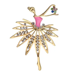 Detail of ballerina brooch featuring pink enamel and sparkling colorful crystal flowers
