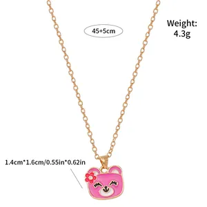 Pink enamel bear head pendant necklace with gold chain and detailed size specifications