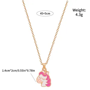 Close-up of pink unicorn pendant with dimensions 1.4cm by 2cm and 45cm gold chain