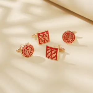 Macro detail of square and round cufflinks with red enamel and golden Double Happiness symbol