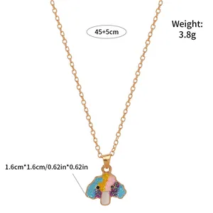 Detail of colorful glitter mushroom pendant with gold chain and size measurements