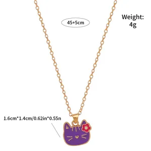 Close-up of purple enamel cat pendant with floral detail and necklace dimensions
