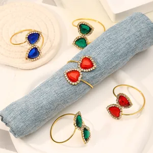 Elegant Heart of the Ocean napkin rings with colorful crystals and golden finish for weddings