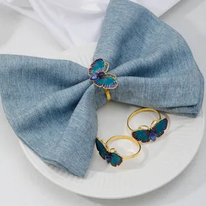Anillo de servilleta de mariposa dorada con diamantes azules para decoración de mesa