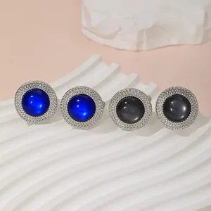 Classic silver rhodium plated cufflinks with sapphire blue and grey round cat-eye stone