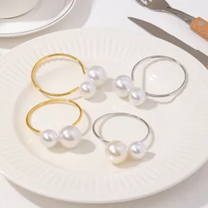 Servilleteros de doble perla en oro y plata para decoración de mesa de Navidad