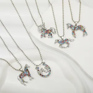 Detailed set of silver alloy unicorn and horse pendants with colorful rhinestones on bead chains